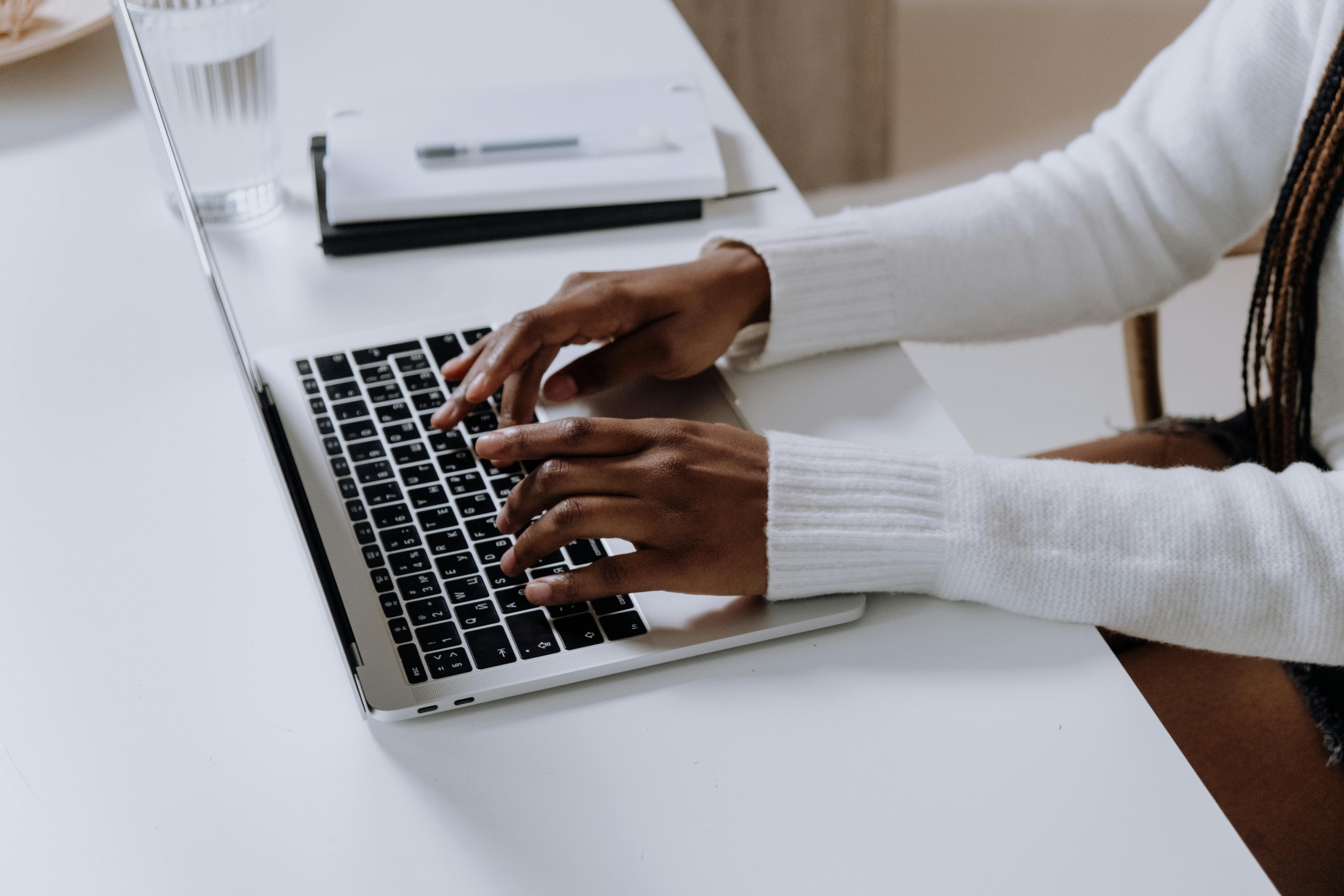 My-Customs member typing on computer